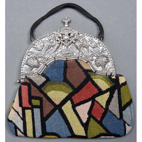 1036 - A Dutch Art Deco wool evening bag, with earlier silver cantle, c1930, 21cm h excluding handle, indis... 