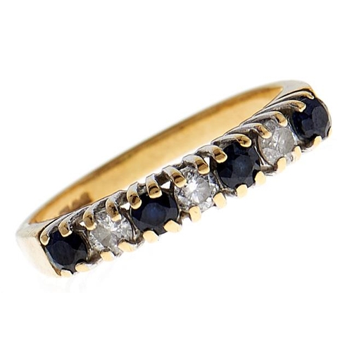 104 - A sapphire and diamond ring, in 18ct gold, 2.2g, size J