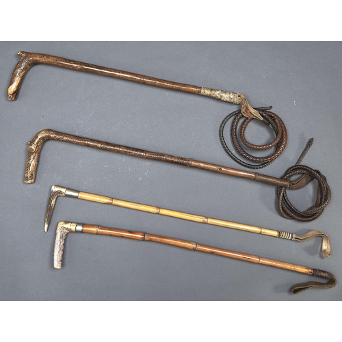 1045 - Two antler handled bamboo riding whips and two others, all late 19th/early 20th c,  one by Swaine &a... 