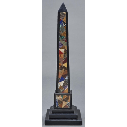 1047 - A Victorian Ashford black marble obelisk, late 19th c  inlaid with coloured hardstones, on step... 