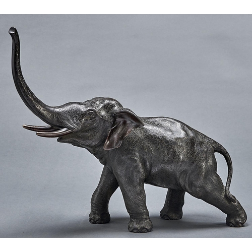 1048 - A Japanese bronze  sculpture of an elephant, Meiji period, even black patina, tusks and ears russet,... 