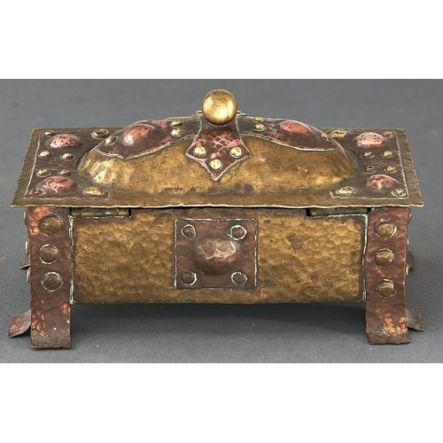 1057 - An Arts and Crafts brass and copper casket, early 20th c  15cm l