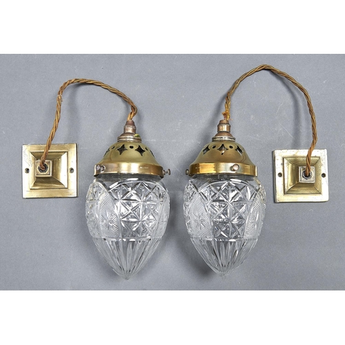 1063 - A pair of early electric brass corridor light pendants, Holophane Co, early 20th c, with moulded gla... 
