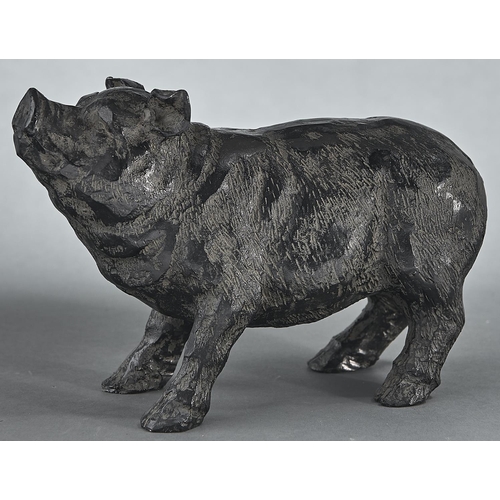 1069 - A black resin sculpture of a pig, 20th c, 15cm h