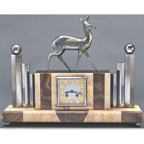 1075 - A French Art Deco noir belge, spelter and chromium plated brass mantle clock, c1930, the rectangular... 