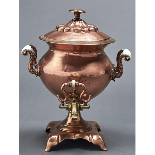 1086 - A Victorian copper tea urn and cover with brass tap, 37cm h