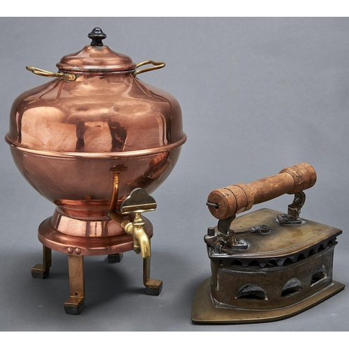 1087 - A copper tea urn and cover with brass tap, 45cm h and a decorative brass flat iron