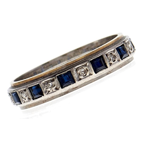 117 - A sapphire and diamond eternity ring, two colour gold mount marked 18ct, 5g, size R