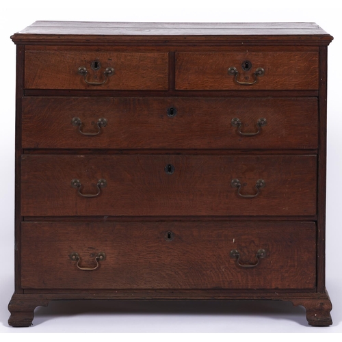 1482 - A George III oak chest of drawers, late 18th c, fitted with two short and three graduated moulded dr... 