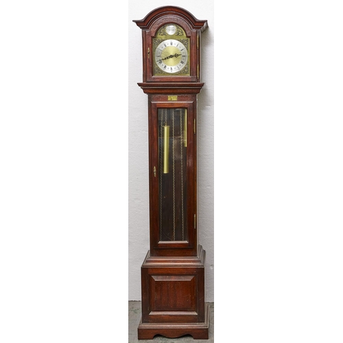 1486 - A reproduction mahogany grandmother clock, arched cavetto moulded hood with arched brass dial, silve... 
