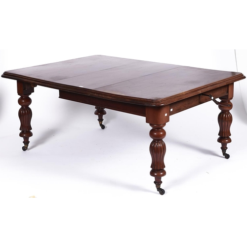 1551 - A Victorian mahogany single leaf extending dining table, the rounded rectangular top with moulded li... 