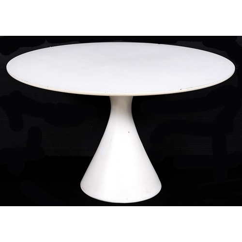 1554 - A circular white modern dining table in the manner of Saarinen, third quarter 20th c, the top above ... 