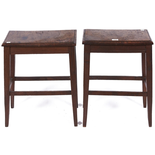 1606 - A near pair of early 19th c stools, c1830, the rectangular figured burr elm tops with moulded lips a... 