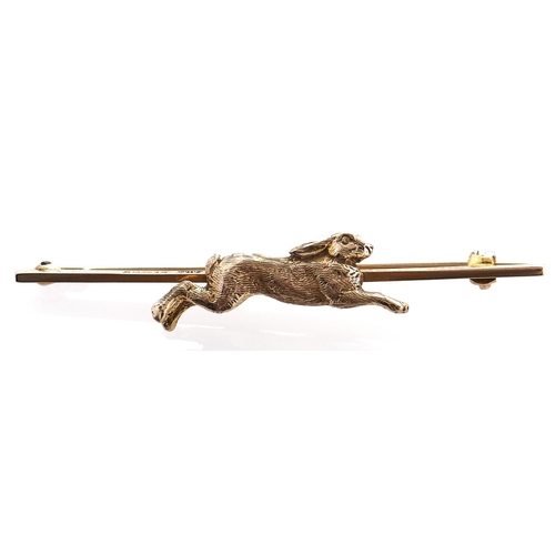 199 - A 9ct gold running hare bar brooch, 6.3g