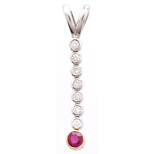 259 - An articulated ruby and diamond pendant, in two colour gold, 1.5g