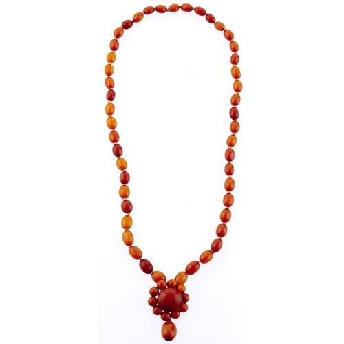 295 - A necklace of amber beads, 32g