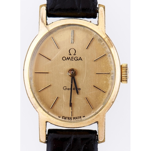 319 - An Omega oval gold plated lady's wristwatch, 20 x 23mm, leather strap, maker's buckle... 