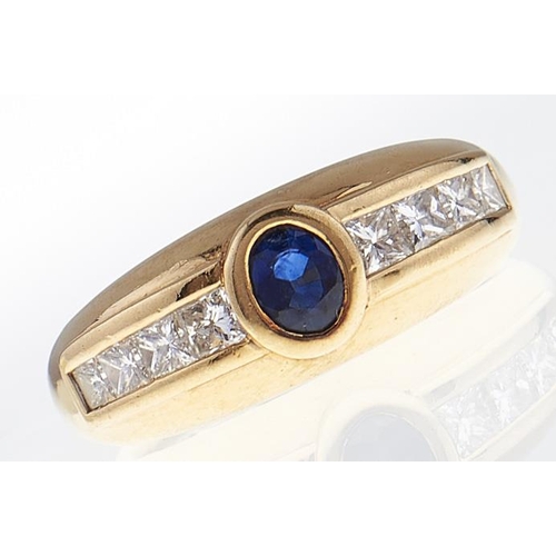 83 - A sapphire and diamond ring, in 18ct gold, 5.2g, size K