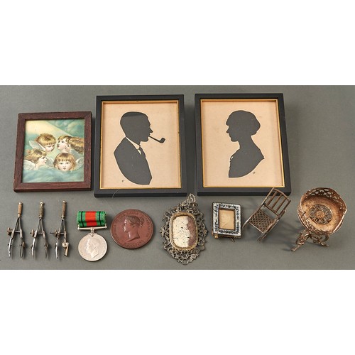 988 - Doll's House Furniture. A giltmetal girandole and table, late 19th c, a miniature brass and micro-mo... 