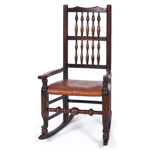 1529 - An early 19th c ash and elm Lancashire spindle back elbow chair, c1830, the back with two rows of fi... 