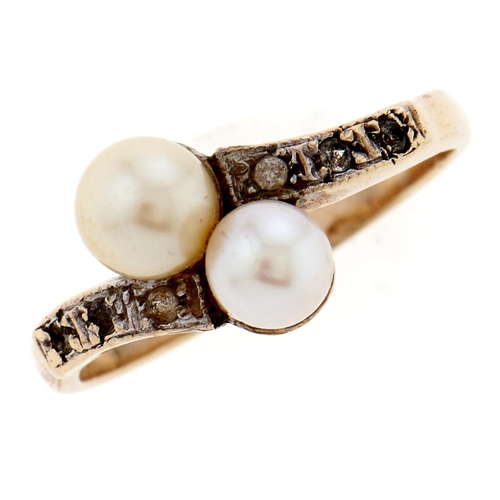 18 - A pearl and white stone crossover ring, in gold, unmarked, 2.5g, size L