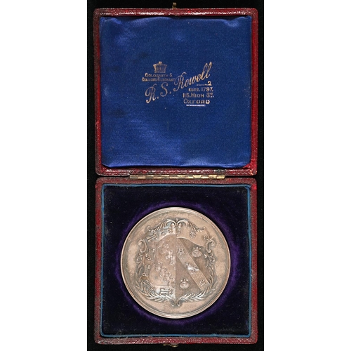 1140 - Oxford University Rowing. Exeter College Boat Club silver medal, obverse arms, reverse garter, bays ... 