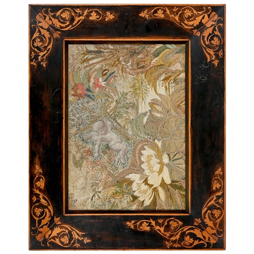 1595 - An embroidered silk picture, late 19th c,&nbsp; of a cherub, waterlilies and other flowers, worked i... 