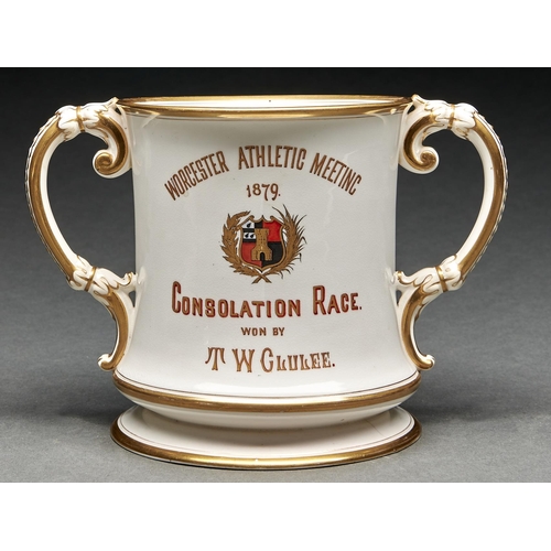 1003 - A Royal Worcester loving cup, 1879, painted with flowers and, to the other side, gilt arms and inscr... 