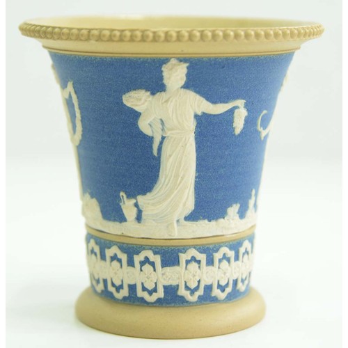 1009 - A Wedgwood drabware shell chamberstick, c1820, the rims gilt, 50mm h, impressed mark and a contempor... 