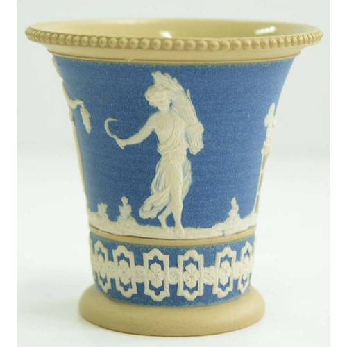 1009 - A Wedgwood drabware shell chamberstick, c1820, the rims gilt, 50mm h, impressed mark and a contempor... 