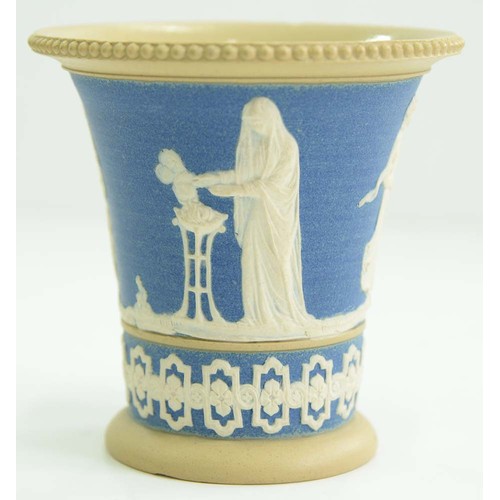 1009 - A Wedgwood drabware shell chamberstick, c1820, the rims gilt, 50mm h, impressed mark and a contempor... 