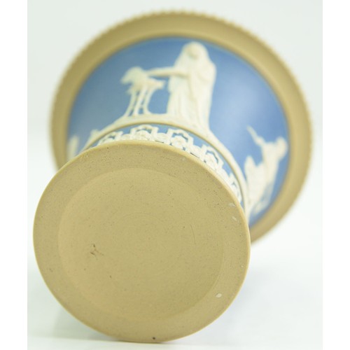 1009 - A Wedgwood drabware shell chamberstick, c1820, the rims gilt, 50mm h, impressed mark and a contempor... 