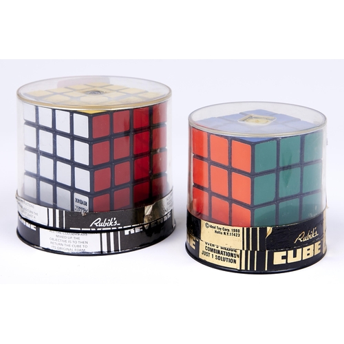 1106 - Two Ideal Corp coloured plastic Rubik cubes, 1980 and 1981, both boxed