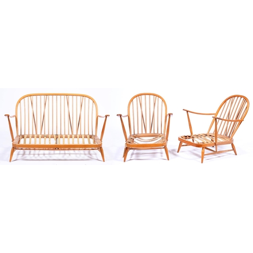 1317 - An Ercol beech settee and pair of armchairs,  settee 133cm w