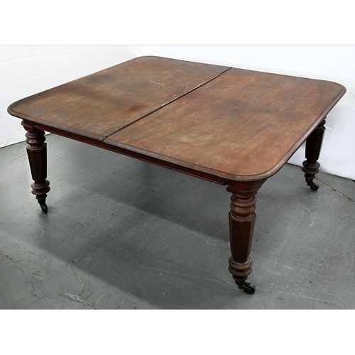 1336 - A Victorian mahogany dining table, c1850, the rectangular top with moulded lip above turned tapered ... 