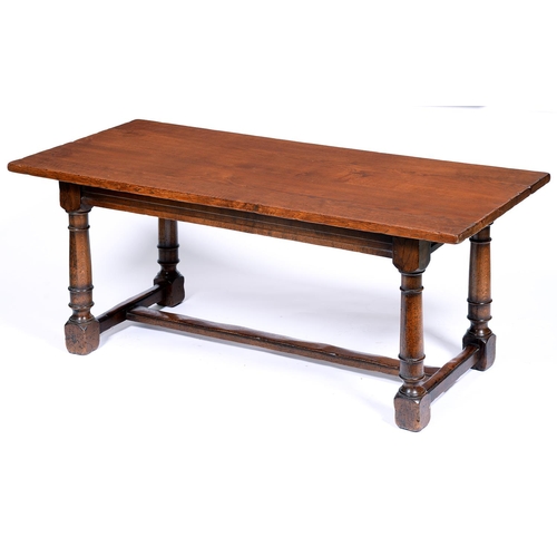 1340 - A oak refectory table, late 20th c, in early 17th c English style, the substantial four plank t... 