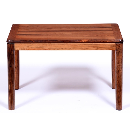 1357 - A rosewood occasional table, c1970,  on round legs,  41cm h; 64 x 44cm... 