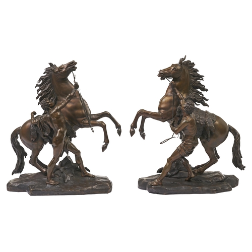 181 - A pair of bronze sculptures of the Marly horses, c1840, after Guillaume Coustou, even golden brown p... 