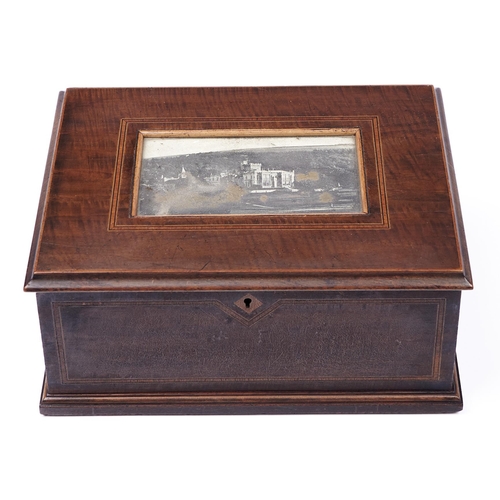 190 - An Edwardian mahogany workbox, the lid inset with a sepia print of The Heath House, silk lined, 25cm... 