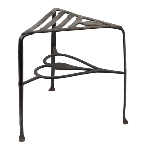 220 - A George III triangular steel trivet, 33cm h