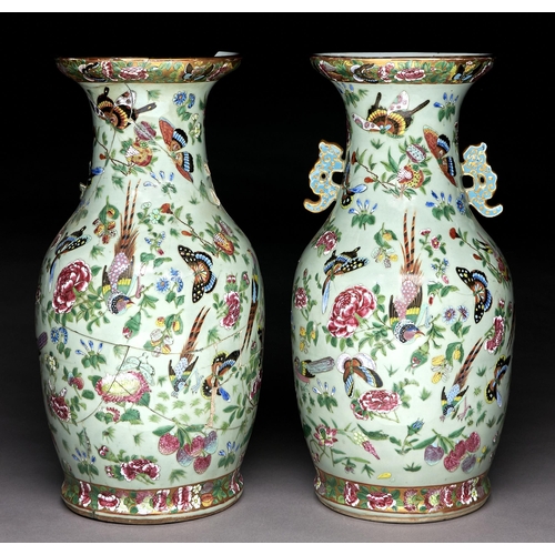 226 - A pair of Chinese Canton famille rose celadon ground vases, mid 19th c, enamelled with colourful bir... 