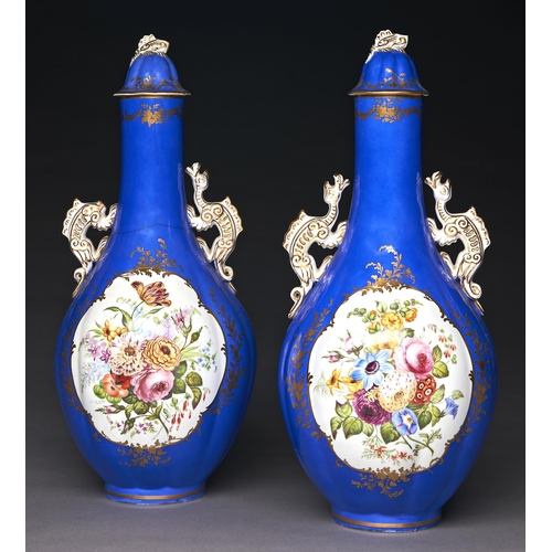 229 - A pair of Staffordshire dragon handled bone china bottle shaped vases and covers, c1850, painted to ... 