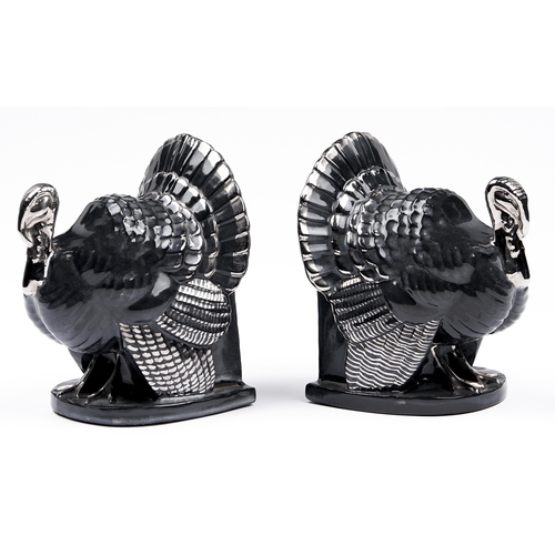 231 - Adrian Allinson ROI (1890-1959) - Turkey bookends, steel blue glazed stoneware with silver lustre, 2... 