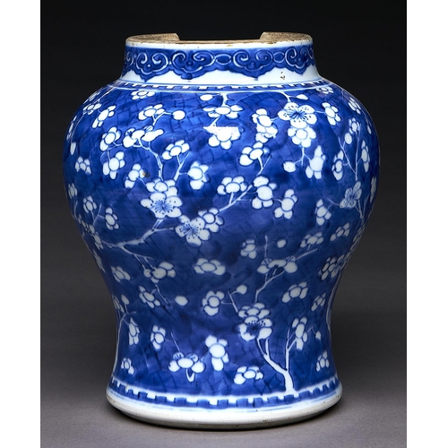 236 - A Chinese blue and white jar, Kangxi period, painted with prunus on a cracked ice ground, 24cm h... 