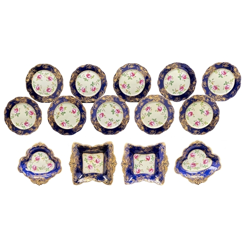 237 - An Aynsley dessert service, c1920, printed and painted with full blown cabbage roses on a primrose g... 