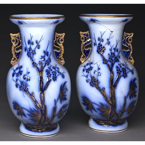 240 - A pair of Staffordshire gilt flow blue earthenware 'Chinese' vases, c1870, moulded to either side in... 