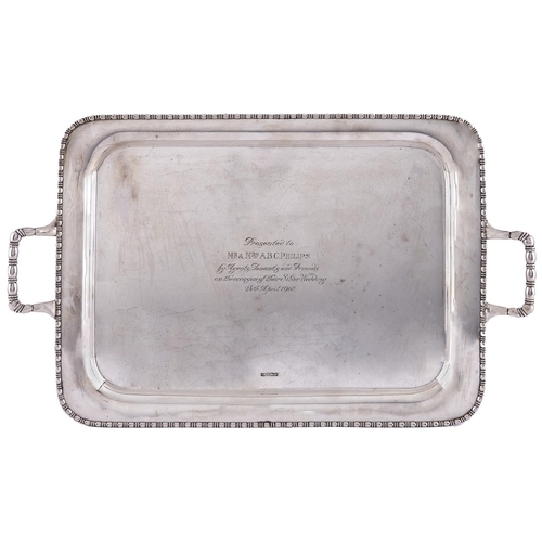 263 - A George V silver tea tray, with bead-and-reel rim, engraved presented to Mrs and Mrs A B C Philips ... 