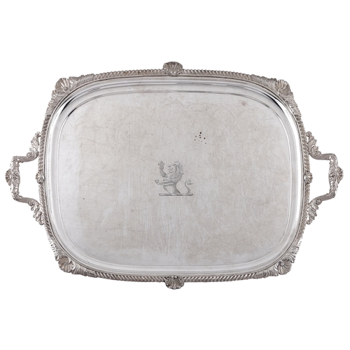 280 - A Sheffield plate tea tray, early 19th c, the gadrooned rim and leafy scrolling handles with shells ... 