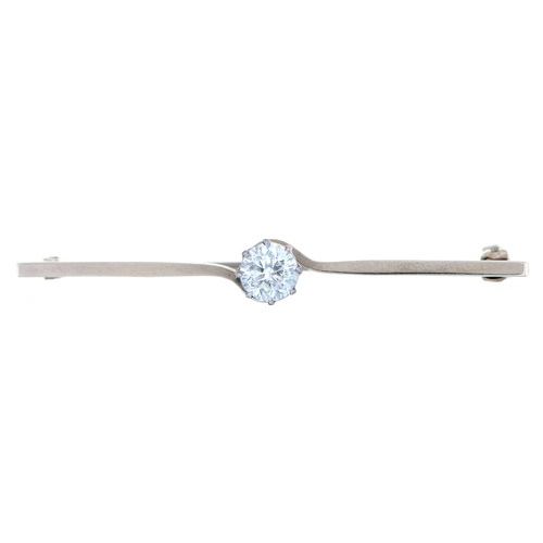 586 - A white stone bar brooch, in white gold, 52mm l, marked 9ct, 2.5g