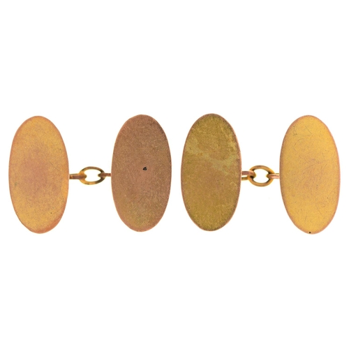 589 - A pair of gold cufflinks, plain oval, 18mm, marked 9ct, 5.4g